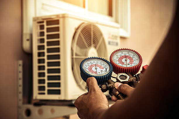Professional Air Conditioning Service technician working in Lemon Springs, NC